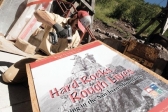 Travis Wolfe works on a sign at the Telluride Historical Museum’s new outdoor mining exhibit. [Photo by Melissa Plantz]