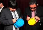 Luis Urzua and Esteban Rojas, two of the miners rescued last year from the Chilean mine collapse.